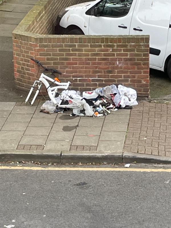 Rubbish all over pavement and bike parts that is dangerous to animals and restricting for disabled pedestrians.-35 Henniker Road, Stratford, London, E15 1JY