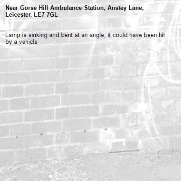 Lamp is sinking and bent at an angle, it could have been hit by a vehicle-Gorse Hill Ambulance Station, Anstey Lane, Leicester, LE7 7GL