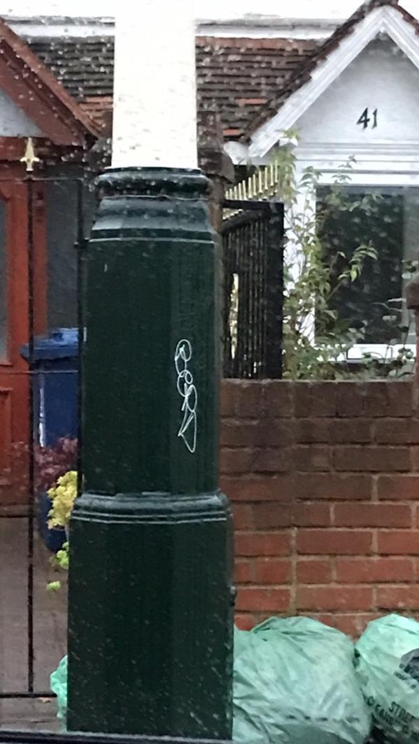 White felt pen tag is located on a lamp column outside 41 Lavington Road W13-49 Lavington Road, West Ealing, W13 9LS