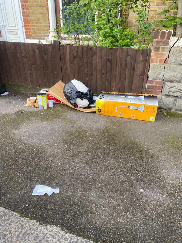 Excess rubbish left outside houses -21 Clifton Road, Forest Gate, London, E7 8QE