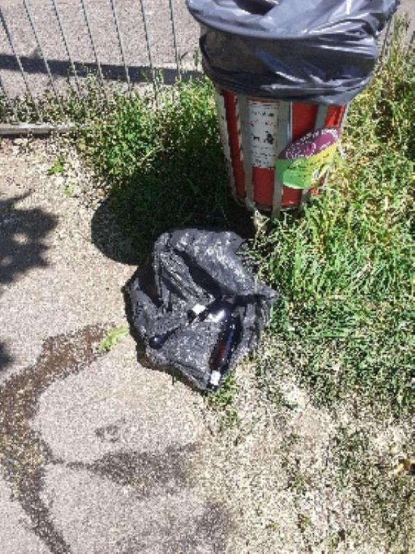 bag of domestic waste left in park -89 Kensington Road, Reading, RG30 2SZ