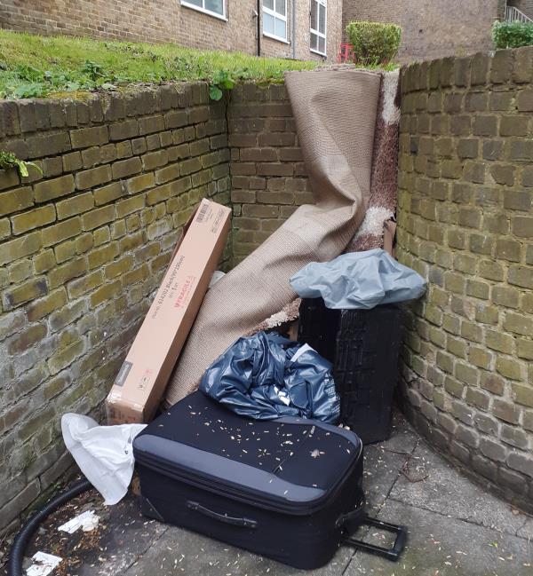 Suitcase, carpet, crate etc dumped.-79 Walerand Road, Blackheath, London, SE13 7PQ