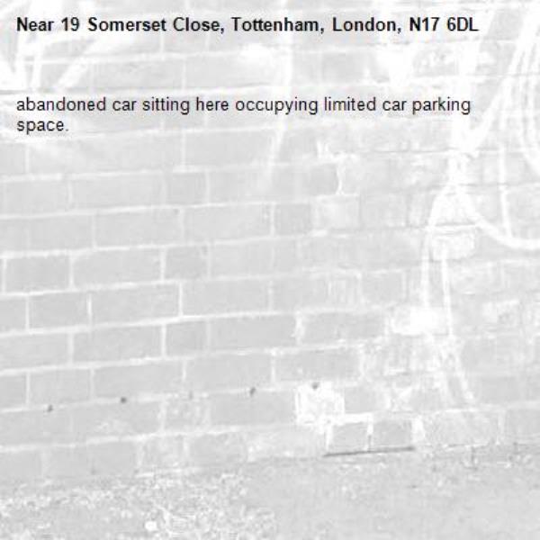 abandoned car sitting here occupying limited car parking space.-19 Somerset Close, Tottenham, London, N17 6DL