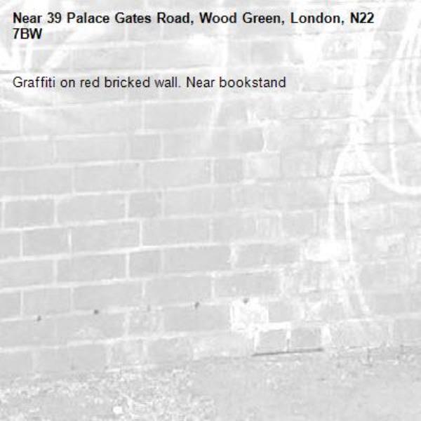 Graffiti on red bricked wall. Near bookstand-39 Palace Gates Road, Wood Green, London, N22 7BW