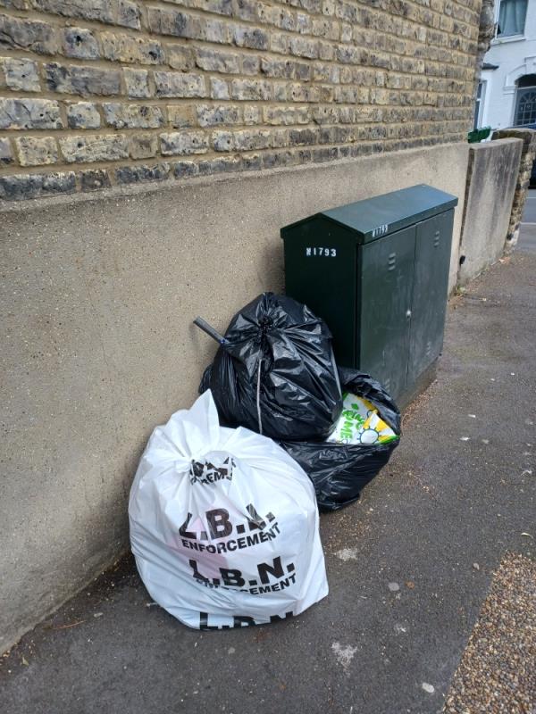 Cardboard boxes and household waste fly tipped at 54 Dundee Road, E13. -54 Dundee Road, Plaistow, London, E13 0BQ