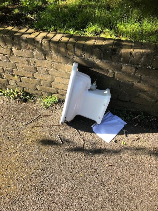 On Footpath to Perry Hill.  Please clear a toilet pan-124 Polecroft Lane, London, SE6 4EG