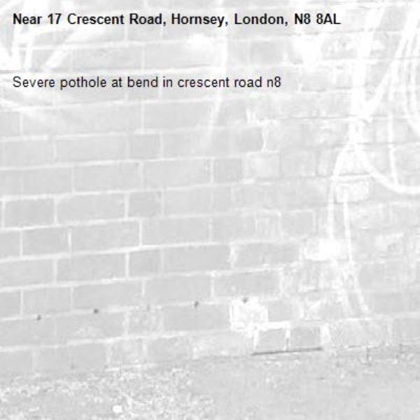 Severe pothole at bend in crescent road n8-17 Crescent Road, Hornsey, London, N8 8AL