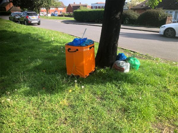 Please clear flytip from grass area opposite property-17 Swiftsden Way, Bromley, BR1 4NS