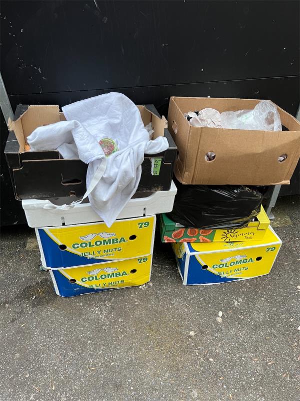 More boxes added to the original pile of fruit boxes left from the smoothie shop-1 Woodford Road, Forest Gate, London, E7 0DH
